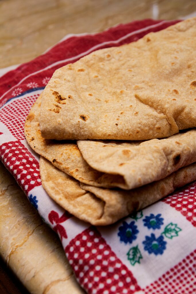 Chapati, red floral tea towel